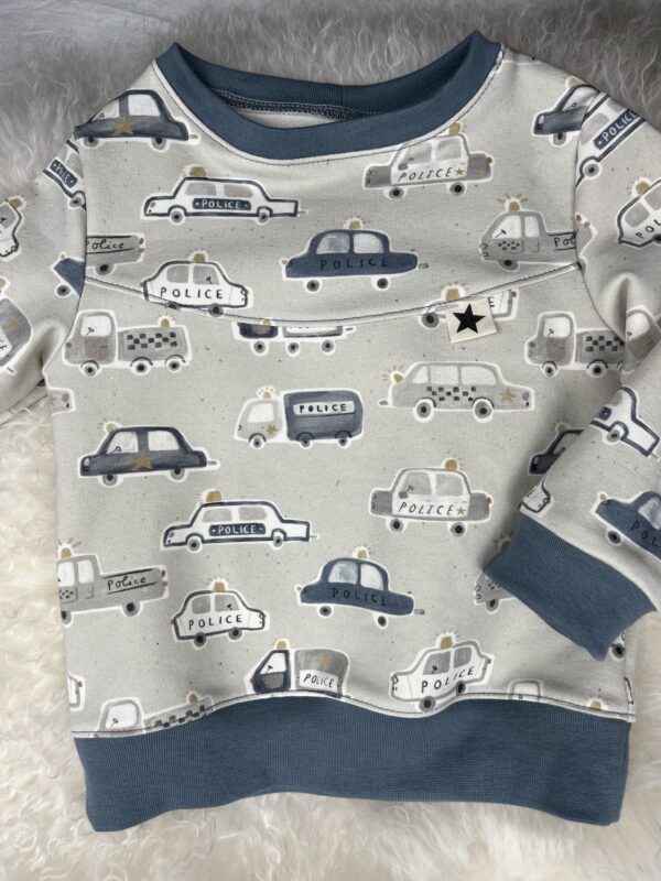 Pullover «Pullover mit Teilung - Polizei Einsatzfahrzeuge» Grösse 86