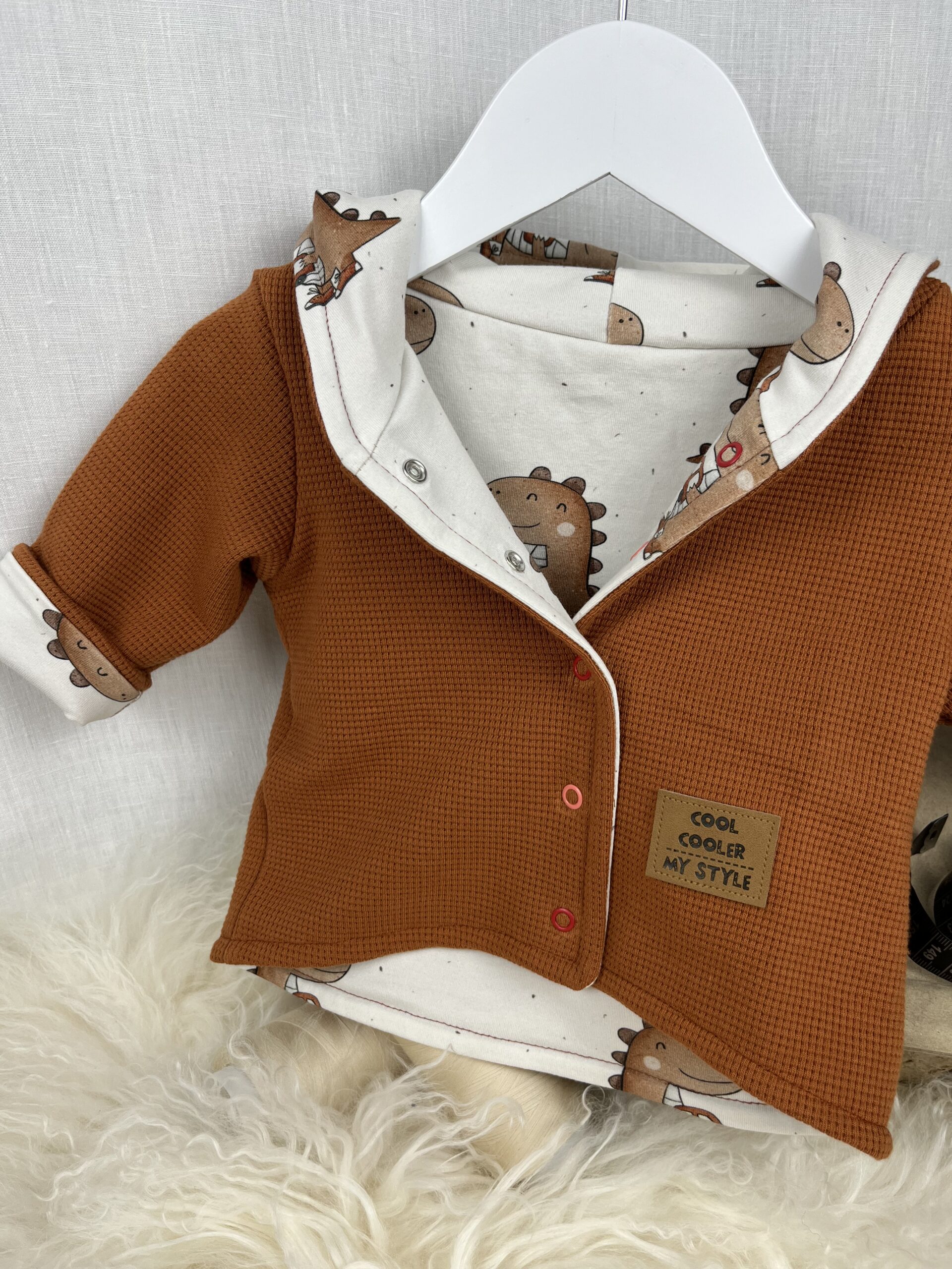 Jacke «Wendejacke mit Zipfelkapuze - kleiner Dino» Grösse 62
