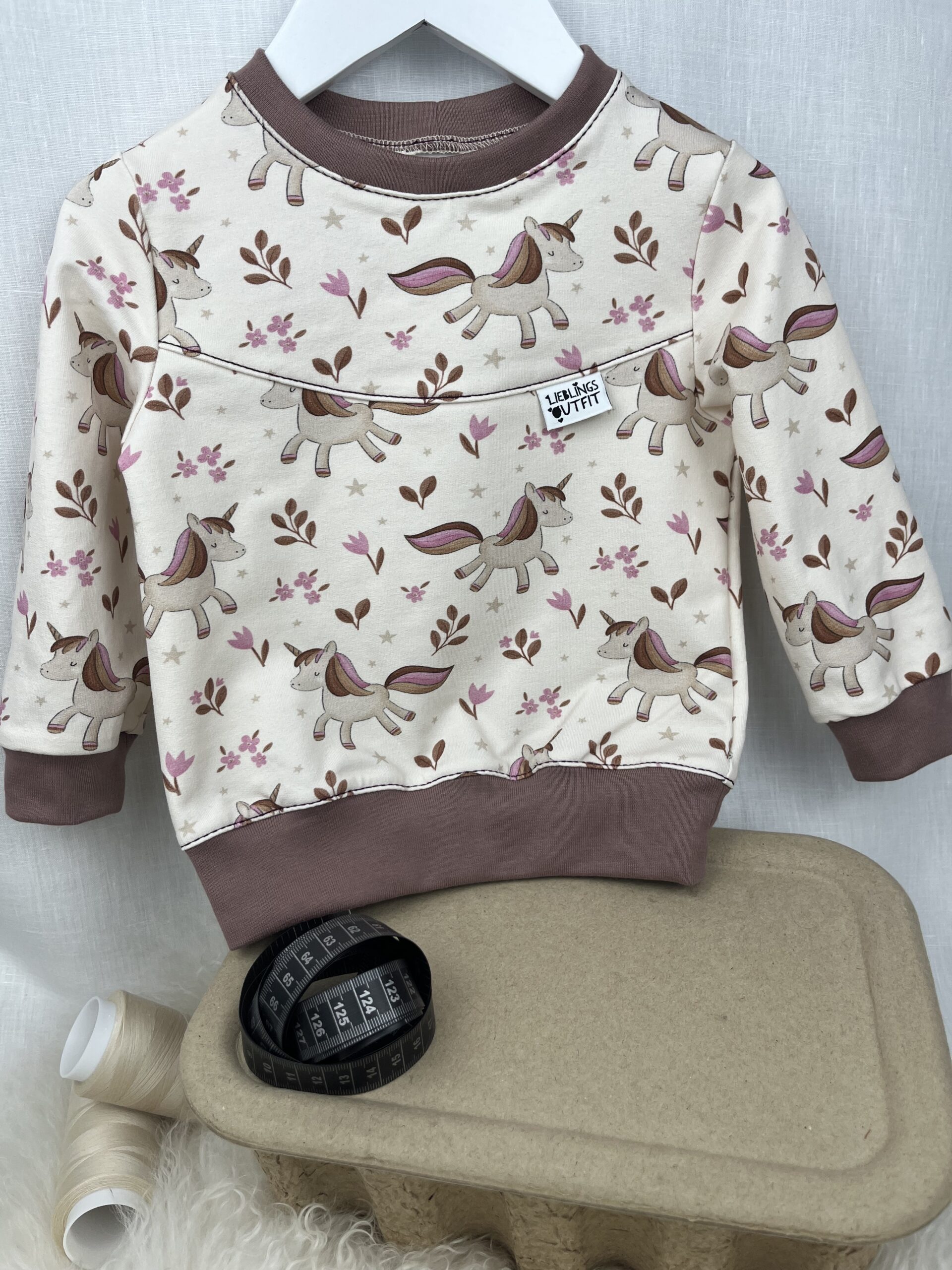 Pullover «Pullover mit Teilung - Einhorn» Grösse 86